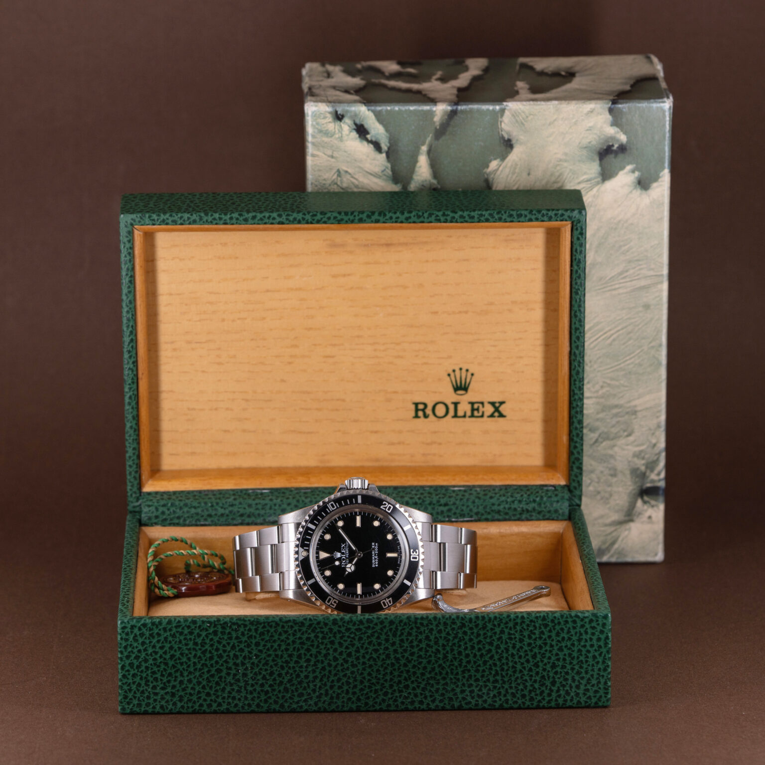 Rolex Submariner 5513 from 1990. Full-set with box and papers.