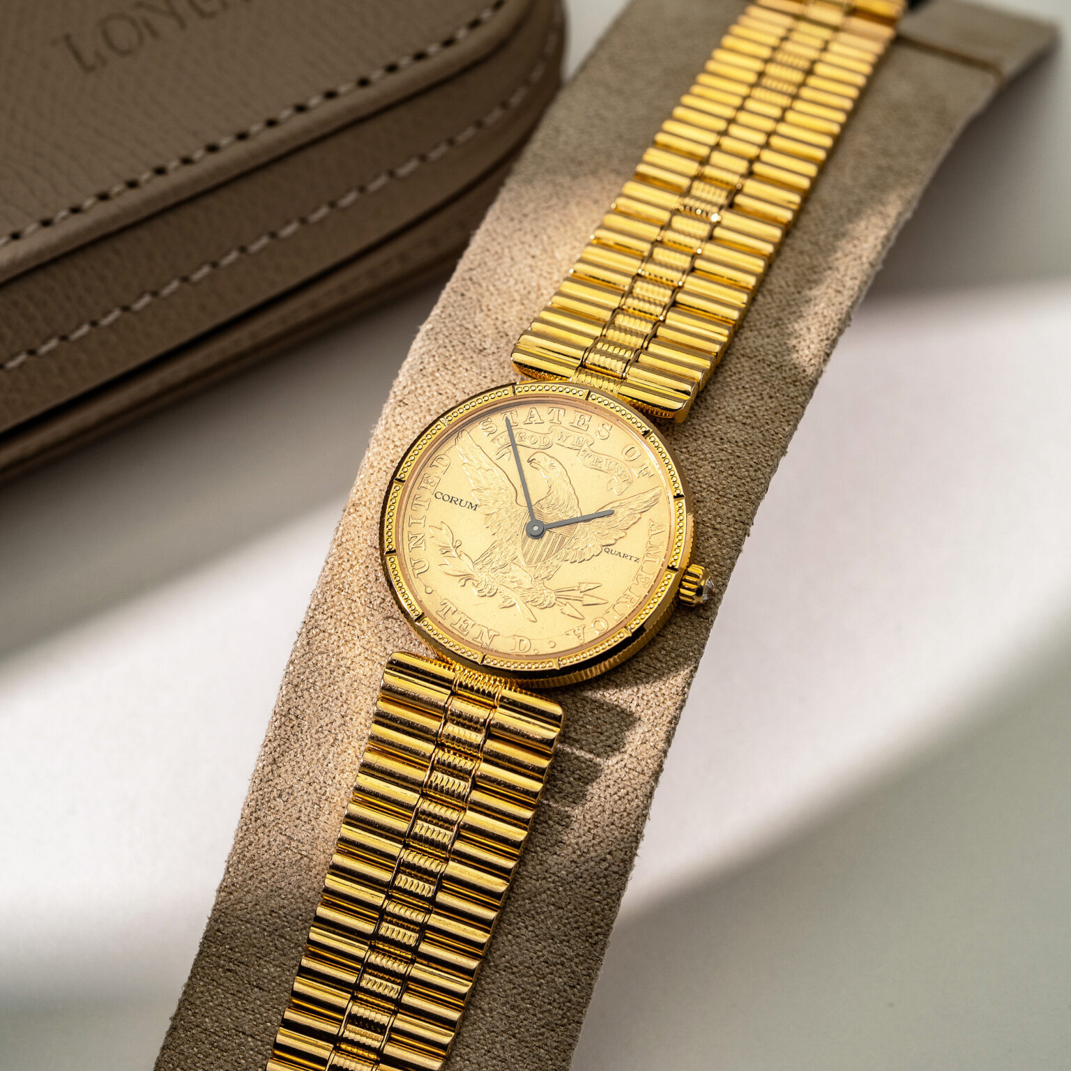 18k Corum Eagle Liberty-head coin watch.
