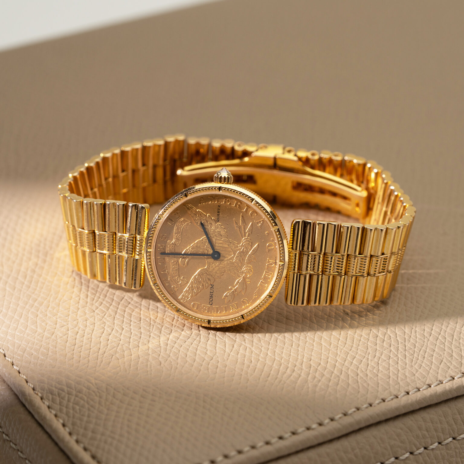 18k Corum Eagle Liberty-head coin watch.
