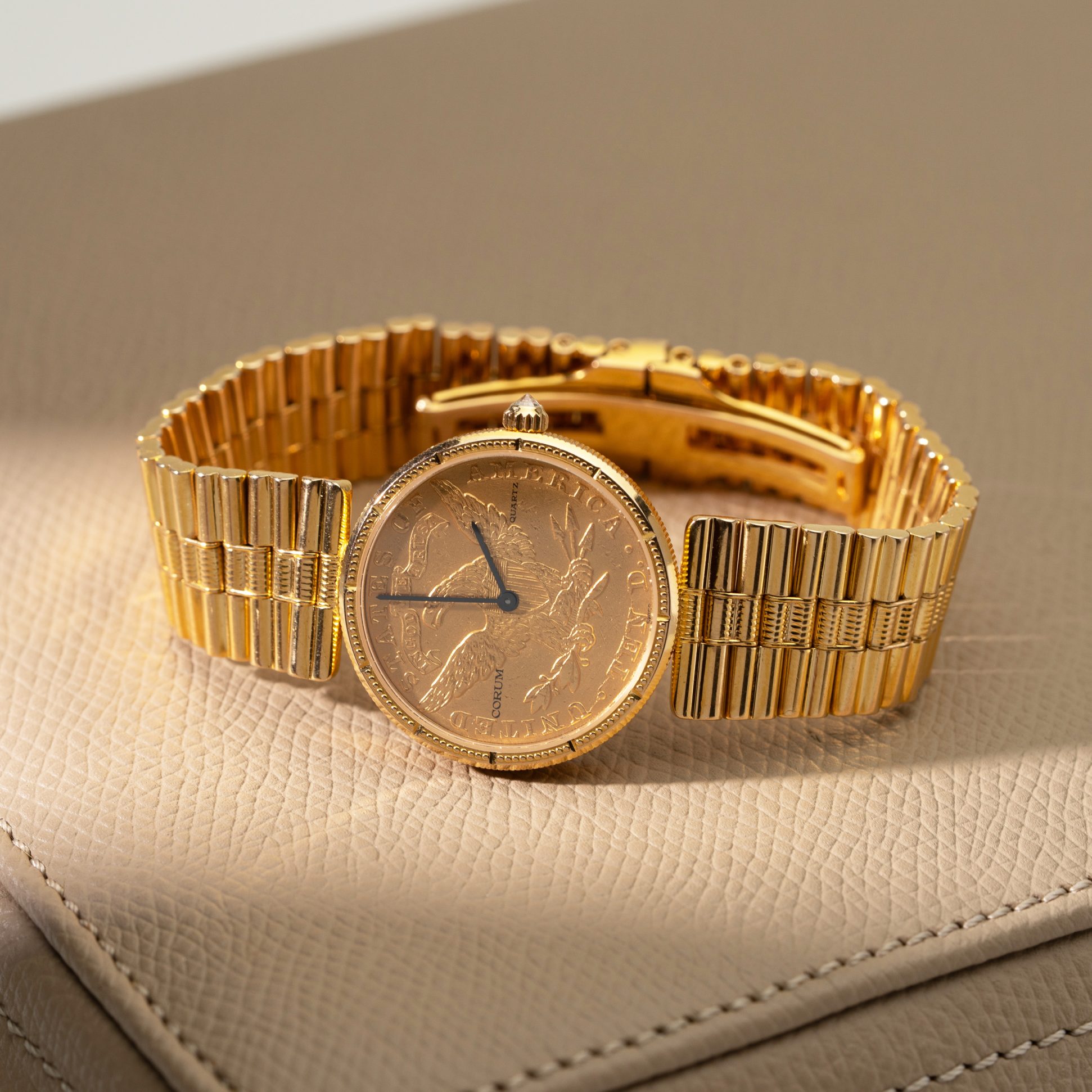 18k Corum Eagle Liberty-head coin watch.