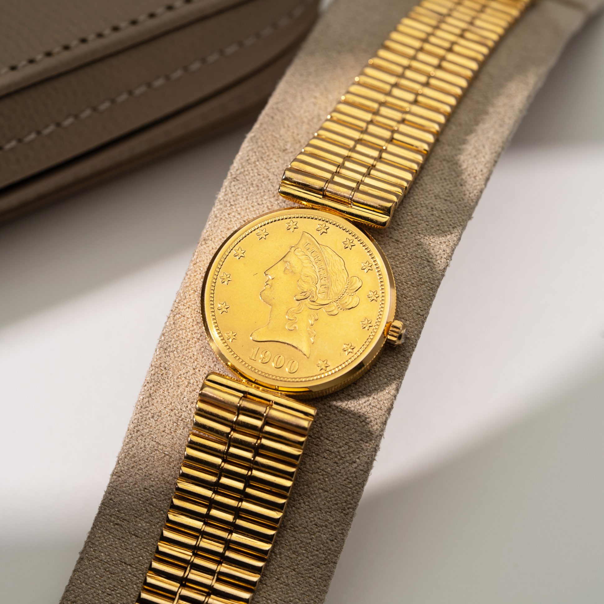 18k Corum Eagle Liberty-head coin watch.