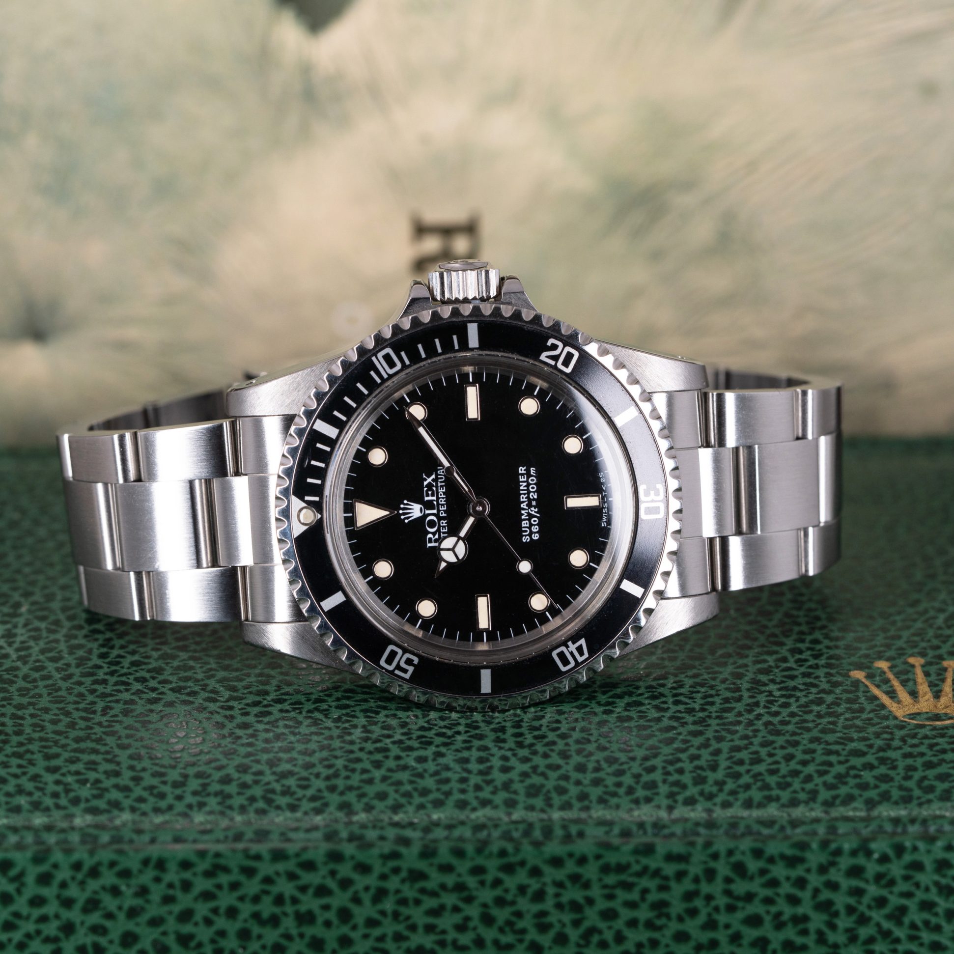 Rolex Submariner 5513 from 1990. Full-set with box and papers.