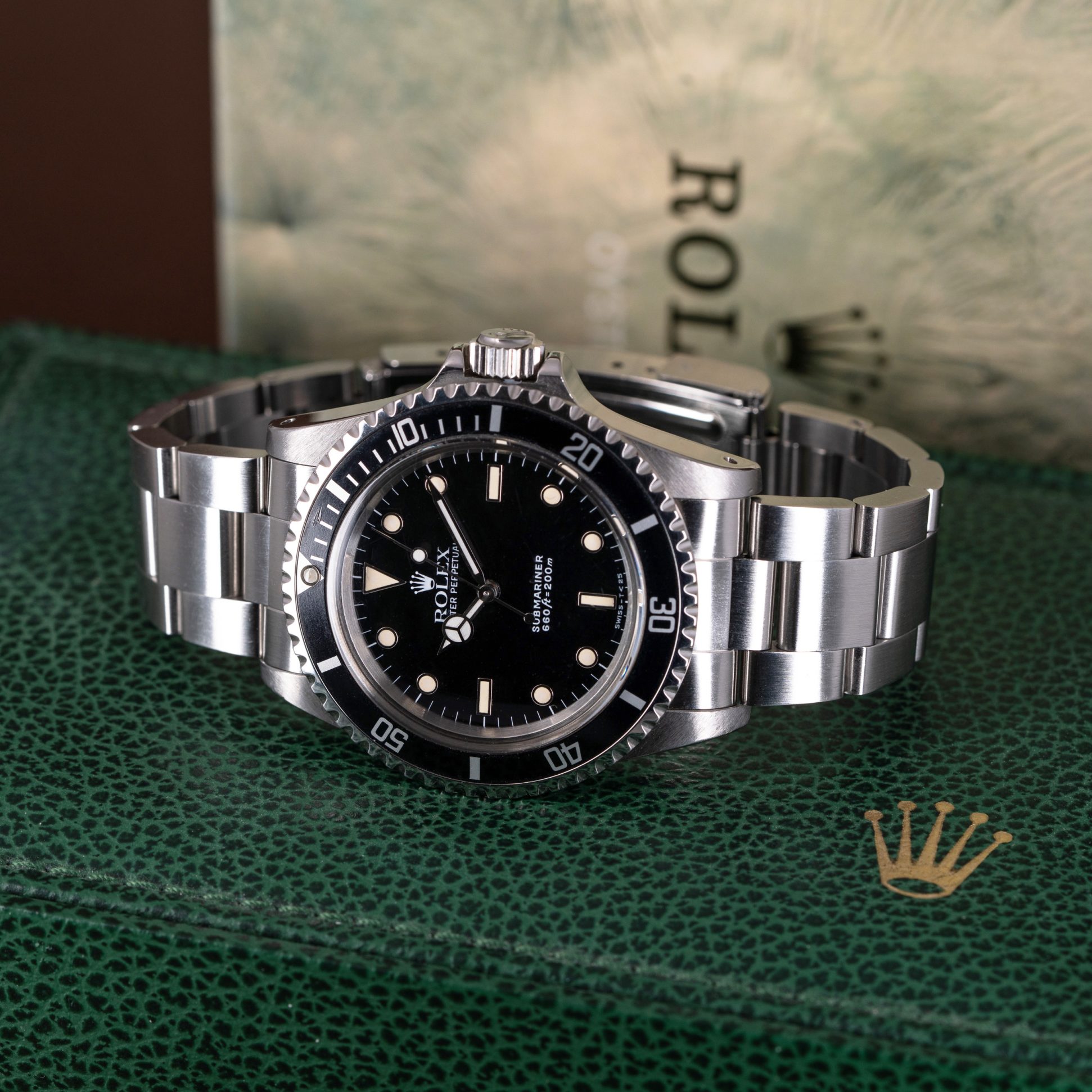 Rolex Submariner 5513 from 1990. Full-set with box and papers.