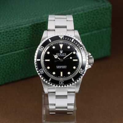 Rolex Submariner 5513 from 1990. Full-set with box and papers.